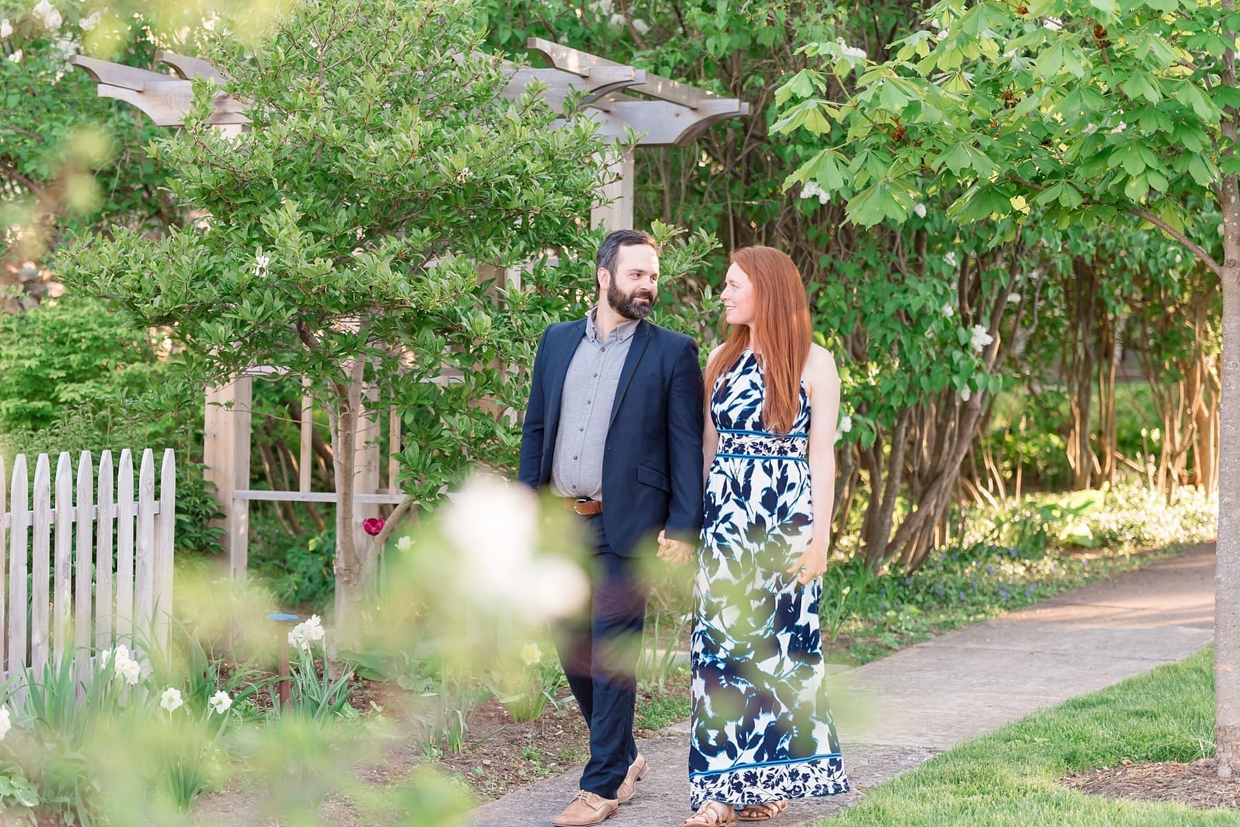ChamplainValley_Engagement-28_LakeChamplain_Photographer_NY_CP Couple walking down pretty tree lined street