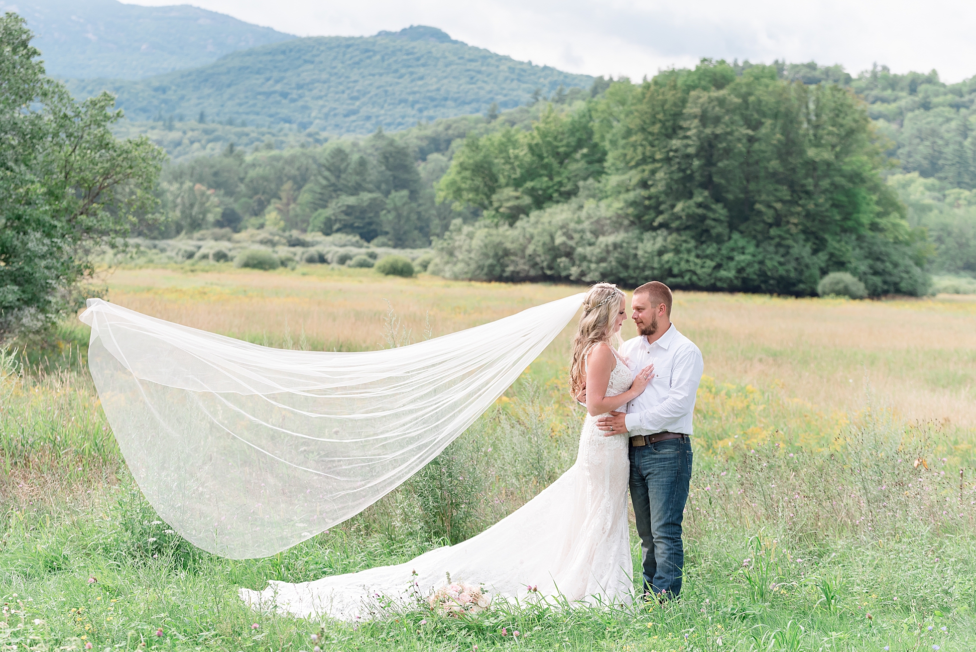 Adirondack wedding portraits of the bride and groom in the mountains