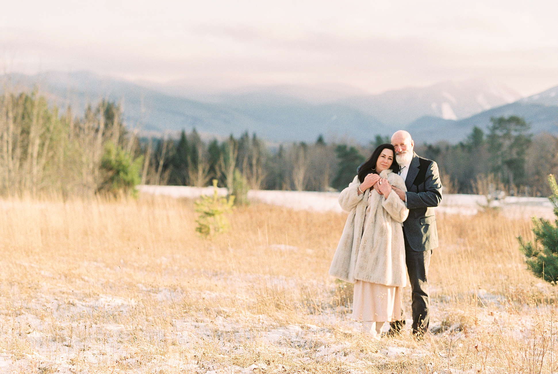 Lake_Placid_Winter_Vow_Renewal_Photos_1148 A stunning winter portrait session in the Adirondack mountains of upstate NY with the mountains glowing in the background