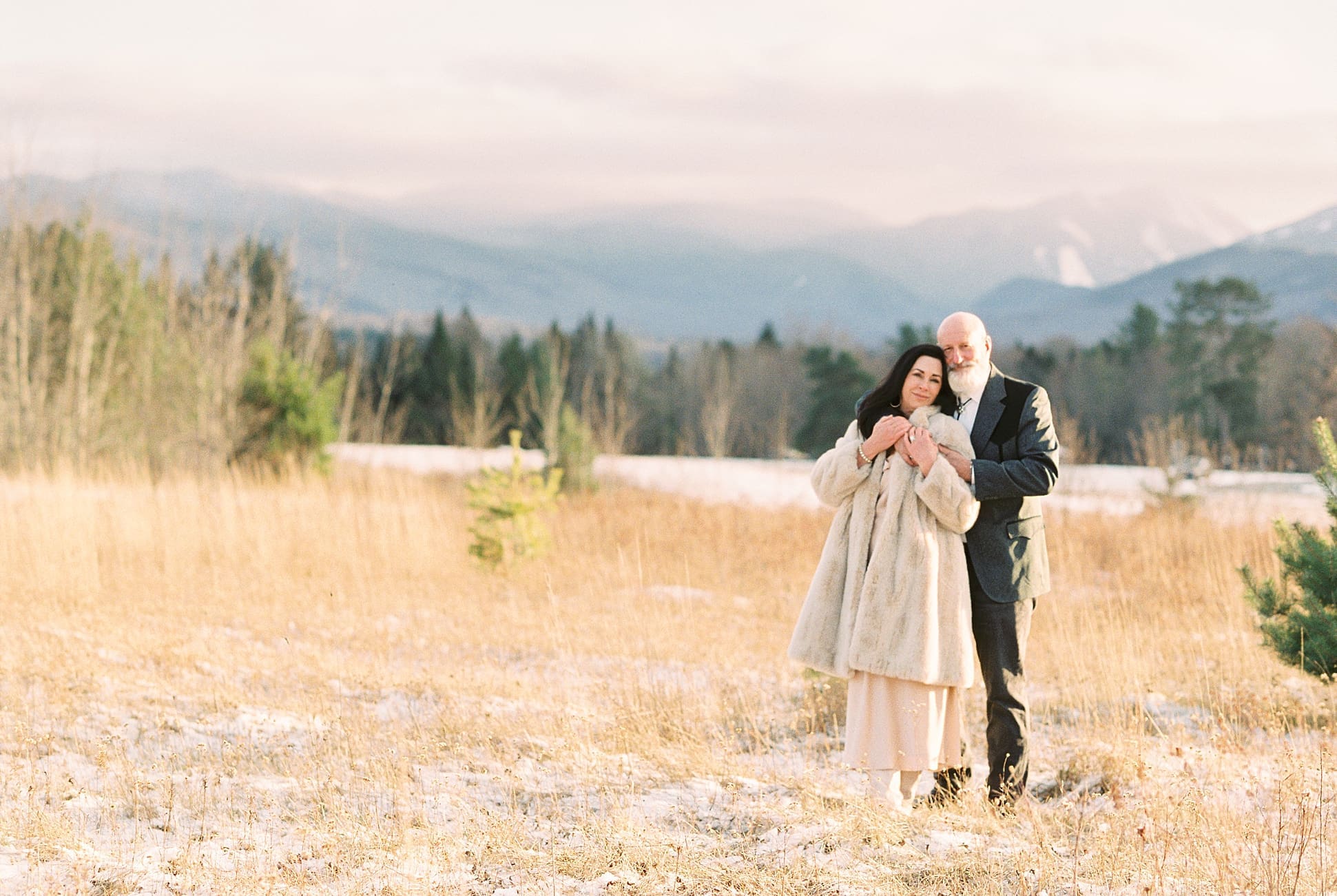 Lake_Placid_Winter_Vow_Renewal_Photos_1148 A stunning winter portrait session in the Adirondack mountains of upstate NY with the mountains glowing in the background