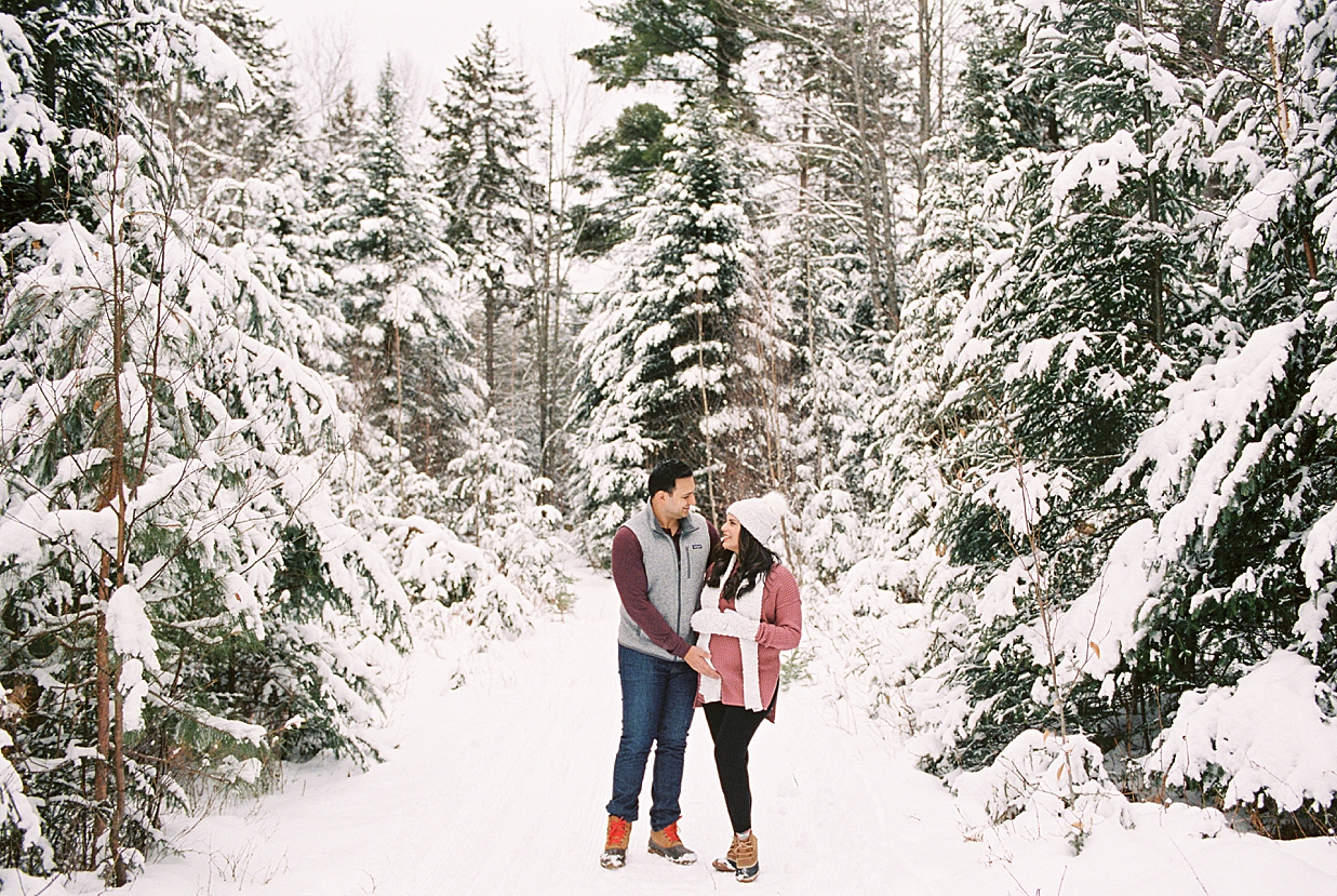 Lake_Placid_Lodge_Winter_Maternity_Session_QS_Photos_0258 snowy maternity session in the adirondacks woods in the wintertime